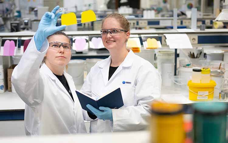 Experts in the lab with Vibrantz white jackets